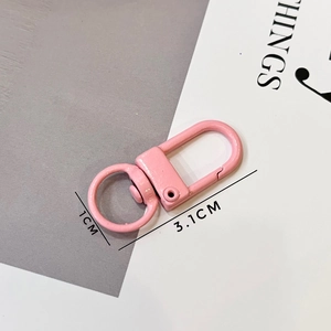 Detail view of 3.1cm pink lobster clasp with 1cm rotating metal ring for keychains