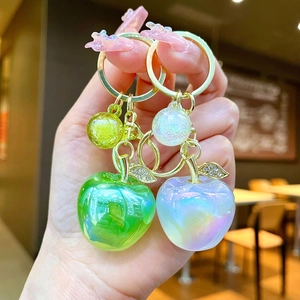 Creative apple keychain charm with green resin and gold rhinestones for bags