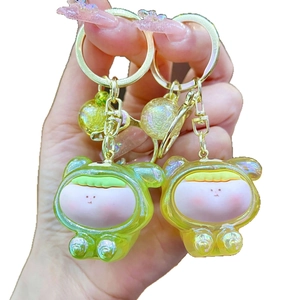 Cute mini acrylic cartoon doll keychain with bubble beads in neon green and yellow