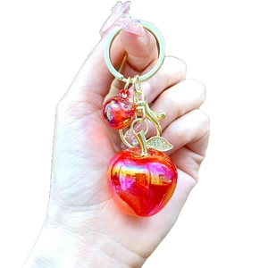 Creative red laser apple keychain with sparkling rhinestone leaf and golden ring for bags
