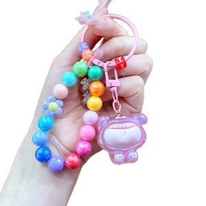 Rainbow DIY bead keychain with colorful letter beads and cute teddy bear pendant