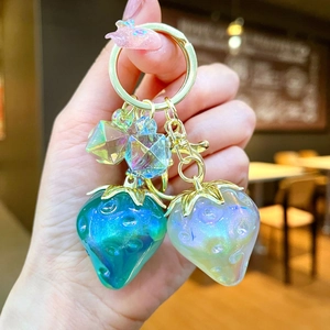 Aurora strawberry keychain with pearlescent gradient resin charms and gold hardware