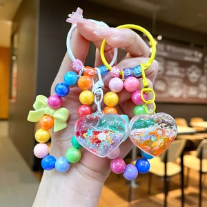 Luminous heart keychain with colorful beads and glitter sand pendants for bags