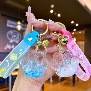 Porte-clés patte de chat lumineux avec paillettes mouvantes et dragonne en silicone