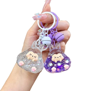 Luminous glitter liquid oil keychain with cute animal charms and colorful bells