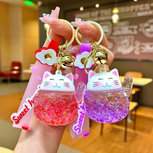 Cute liquid sand Maneki Neko keychain with glitter cat pendant and sweet wrist strap