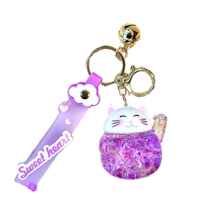 Cute lucky cat keychain with purple liquid glitter sand and sweet heart lanyard
