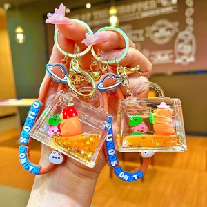 Cute Capybara liquid keychain with sequins and orange silicone strap for bags