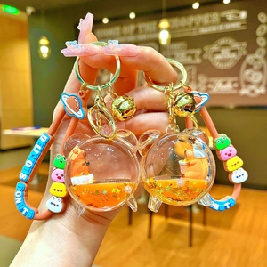 Cute capybara liquid quicksand keychain with bear head charms and silicone wristband set