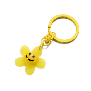 Yellow sunflower keychain with a smiling face and metallic clasp for DIY accessories