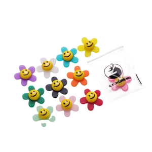 Colorful acrylic sunflower charms with cartoon smiley face centers for DIY hair accessories