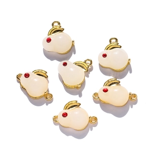 Lot de breloques lapin dorées avec résine blanche et yeux en cristal rouge pour DIY
