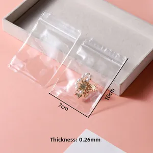Detail of 7x10cm thickened transparent PVC jewelry bag showing 0.26mm thickness scale