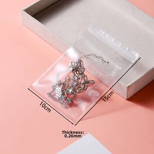 Thickened 0.26mm transparent PVC jewelry pouch with secure seal measuring 10x15cm