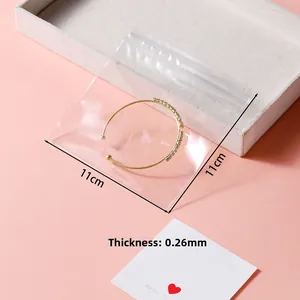 Detail view of 11x11cm thick transparent PE jewelry zip bag with 0.26mm thickness