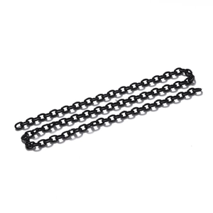 Close-up of black acrylic chain links for DIY glasses and mask strap accessories