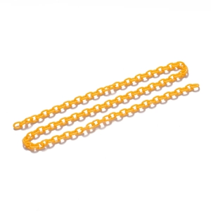 Detail of bright yellow acrylic oval link chain for DIY accessories and mask straps