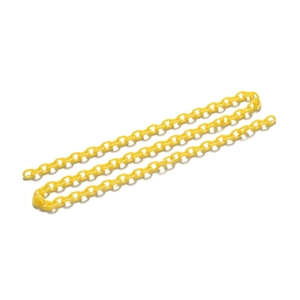 Macro shot of 50cm bright yellow acrylic chain links for DIY glasses and mask accessories