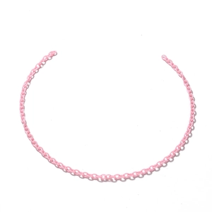 Close-up of pink acrylic chain links with a smooth matte texture for DIY jewelry making