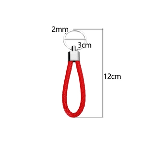 Detailed view of red woven leather keychain with 12cm length and 3cm silver ring