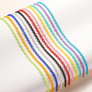 Close-up of vibrant acrylic chain links in multiple colors for DIY glasses and jewelry