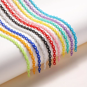 Close-up of 11 colorful acrylic chain links for DIY glasses or mask cords, smooth finish
