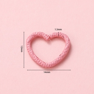 Pink heart-shaped jump ring with textured surface for DIY jewelry making 14x12mm