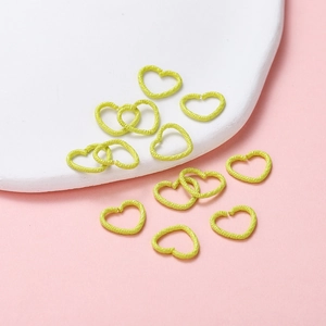 Neon lime heart-shaped open jump rings with textured finish for DIY jewelry crafts