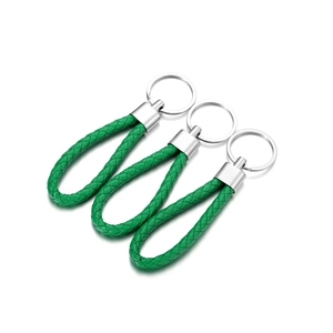Three bright green woven leather cord keychains with silver metal hardware on white background