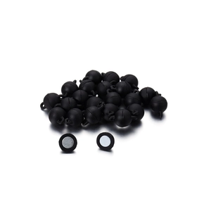 Macro view of matte black spherical magnetic clasps for DIY jewelry and necklaces