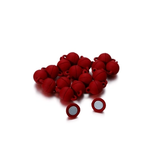 Macro view of red matte magnetic ball clasps for DIY jewelry making and necklaces