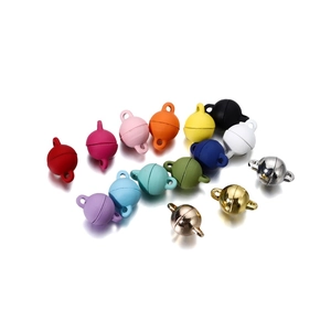 Close-up of multicolored magnetic ball clasps with rings for DIY jewelry necklaces