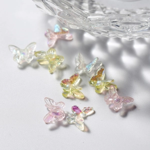 Macro shot of colorful mini resin butterflies for nail art and DIY resin crafts