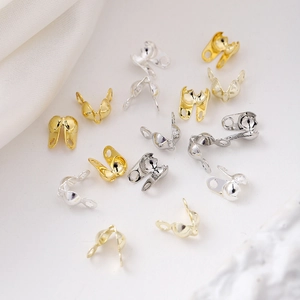 Close-up of gold and silver plated ball chain connectors for DIY jewelry making