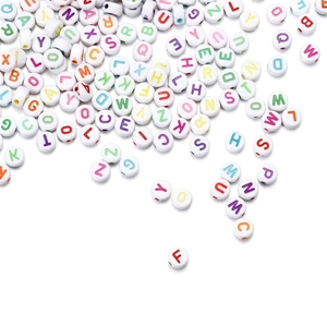 Close-up of colorful acrylic round alphabet beads for DIY jewelry making and bracelets