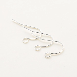Three pieces of minimalist silver DIY earring hooks with polished finish and small rings
