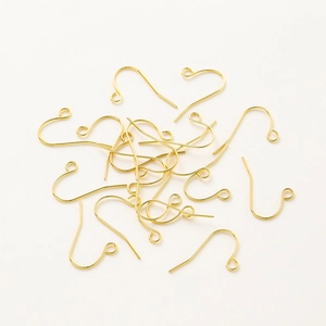 Close-up of bright golden brass fishhook earrings with closed loop connectors