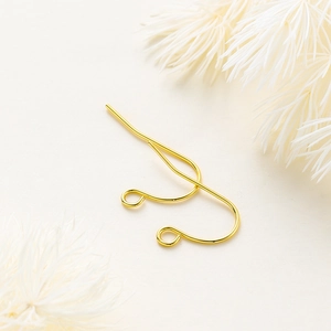Detailed macro view of 14K gold plated brass ear hooks for DIY jewelry making