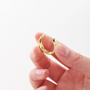 Minimalist 14K gold plated copper small hoop earrings with polished finish on white backdrop