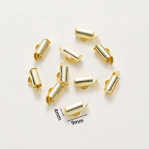 Detalle macro de cierres deslizantes dorados de 9 mm x 4 mm para creación de joyas