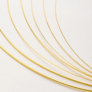 Macro view of various thickness 14K gold plated copper wires for DIY jewelry making