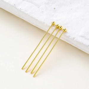 Close-up of 14K/18K gold plated ball head pins for professional DIY jewelry making