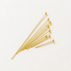 Close-up of 14K/18K gold plated copper ball headpins for DIY jewelry making