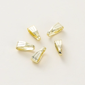 Detail van vijf 14K vergulde knijpcollierlussen met strepen voor het maken van sieraden