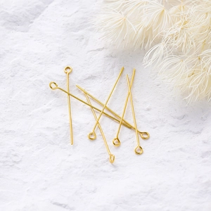 Detailed view of 18K gold plated brass eye pins for DIY jewelry making and beading