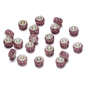 Detalle de cuentas rosas de cristal con agujero grande y núcleo de plata para joyas