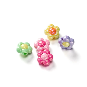 Macro shot of colorful pearlescent flower acrylic beads for handmade DIY jewelry