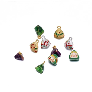 Detailed close-up of multi-colored enamel zongzi charms with festive patterns and gold finish
