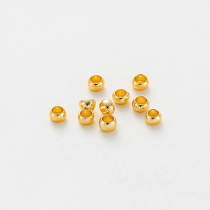 Flat lay of 10 pieces of 14K/18K gold-plated spacer beads for DIY jewelry making