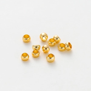 Macro shot of 14K gold plated stopper beads for DIY jewelry making and bracelet finishing